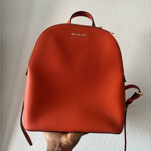 Michael Kors “Cindy” Bold Orange Backpack
